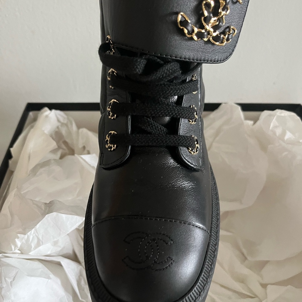 CHANEL Black Leather Combat Boots with Gold Accents